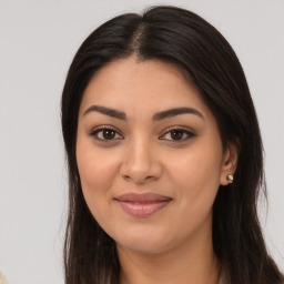 Joyful asian young-adult female with long  brown hair and brown eyes