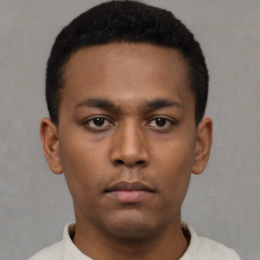Neutral latino young-adult male with short  brown hair and brown eyes