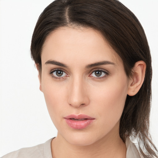 Neutral white young-adult female with medium  brown hair and brown eyes