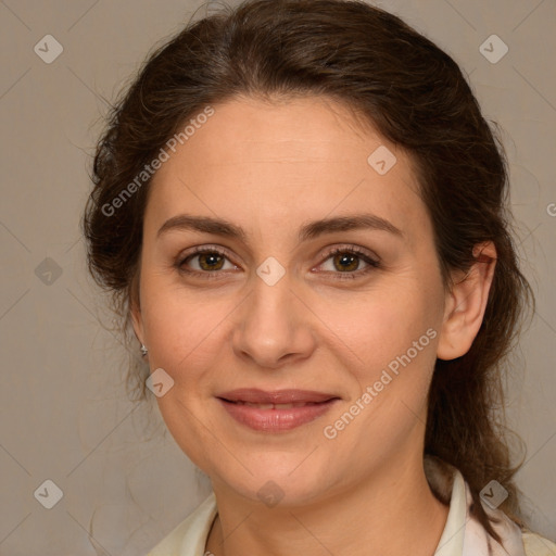 Joyful white young-adult female with medium  brown hair and green eyes