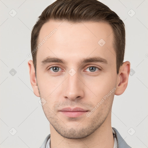 Neutral white young-adult male with short  brown hair and grey eyes