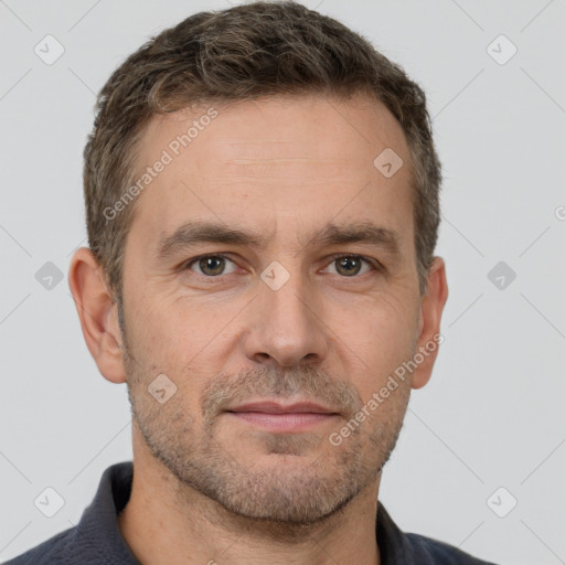 Neutral white adult male with short  brown hair and brown eyes