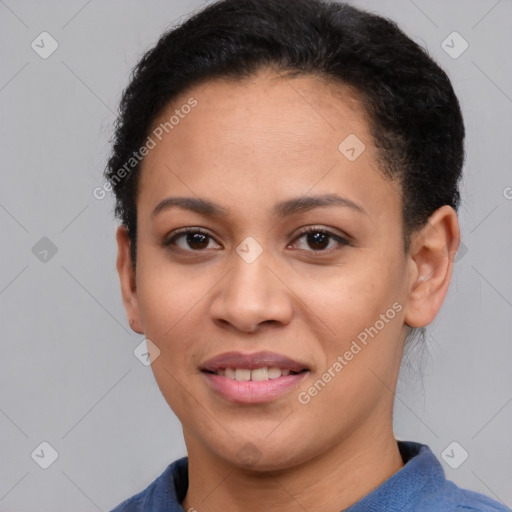 Joyful black young-adult female with short  brown hair and brown eyes