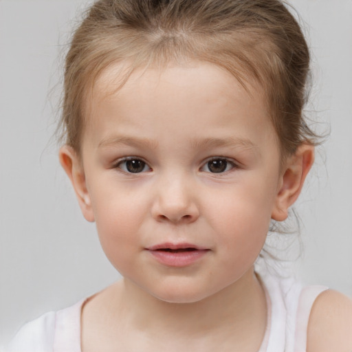 Neutral white child female with short  brown hair and brown eyes