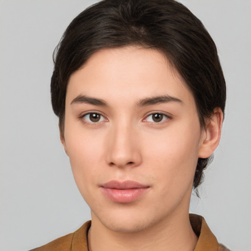 Neutral white young-adult female with short  brown hair and brown eyes