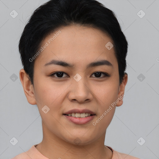 Joyful asian young-adult female with short  black hair and brown eyes