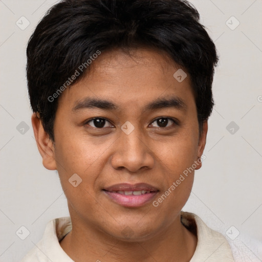 Joyful latino young-adult male with short  brown hair and brown eyes