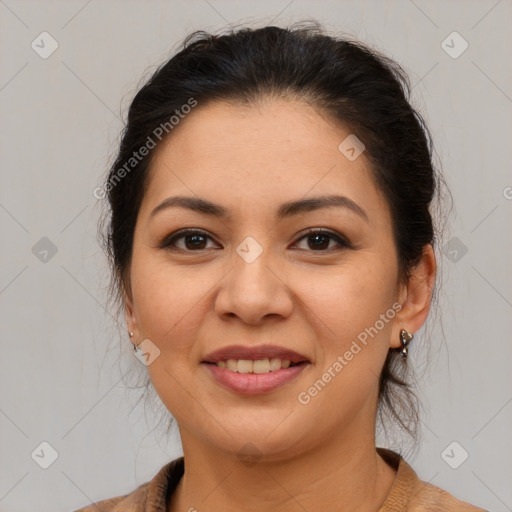 Joyful latino young-adult female with medium  brown hair and brown eyes