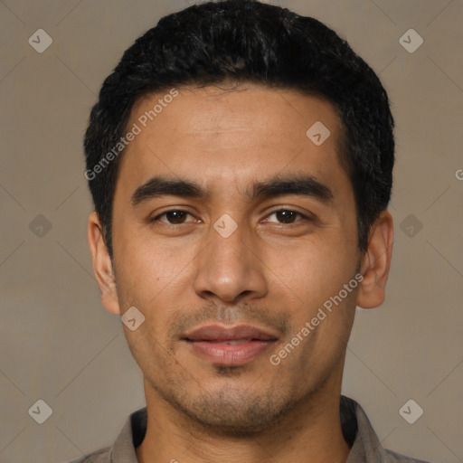 Joyful latino young-adult male with short  black hair and brown eyes