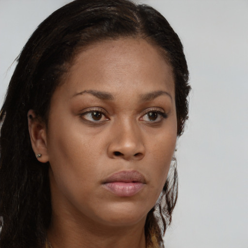 Neutral black young-adult female with long  brown hair and brown eyes