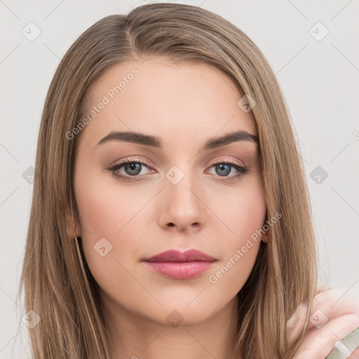 Neutral white young-adult female with long  brown hair and brown eyes