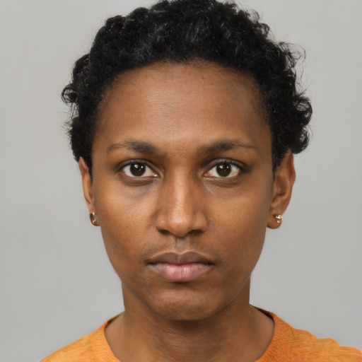 Neutral black young-adult female with short  black hair and brown eyes