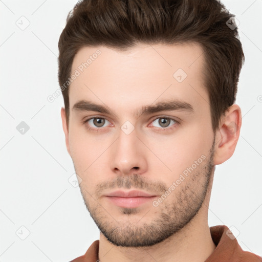 Neutral white young-adult male with short  brown hair and brown eyes