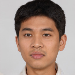 Neutral asian young-adult male with short  brown hair and brown eyes