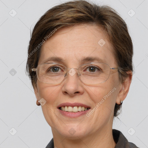 Joyful white adult female with short  brown hair and grey eyes