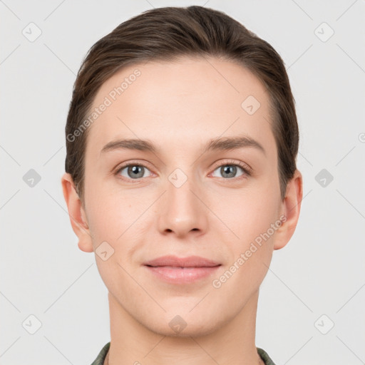 Joyful white young-adult female with short  brown hair and grey eyes