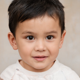 Joyful white child male with short  brown hair and brown eyes