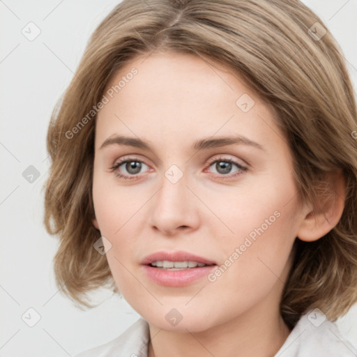 Joyful white young-adult female with medium  brown hair and blue eyes