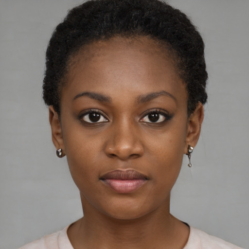Neutral black young-adult female with short  brown hair and brown eyes