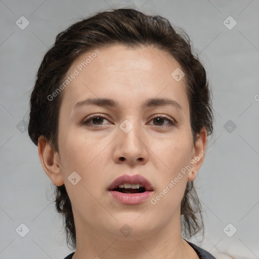 Joyful white young-adult female with medium  brown hair and brown eyes