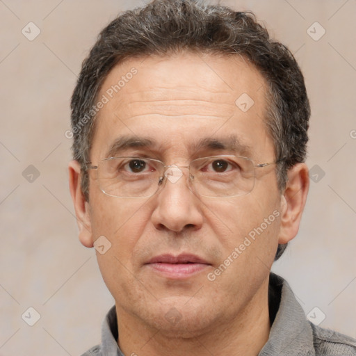 Joyful white middle-aged male with short  brown hair and brown eyes