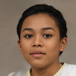 Neutral latino young-adult female with short  brown hair and brown eyes