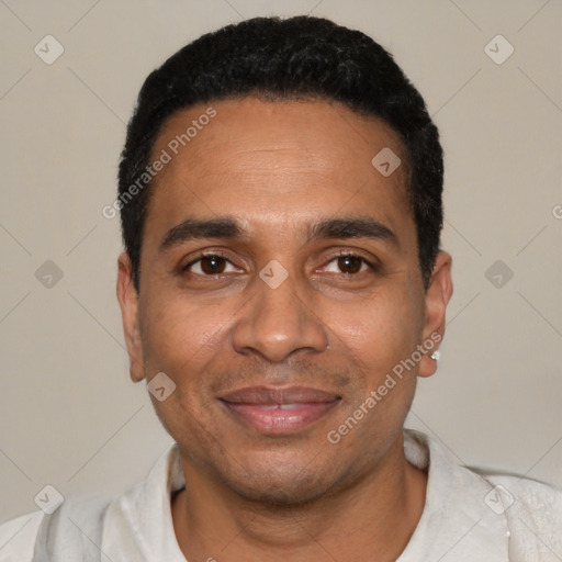 Joyful latino adult male with short  black hair and brown eyes