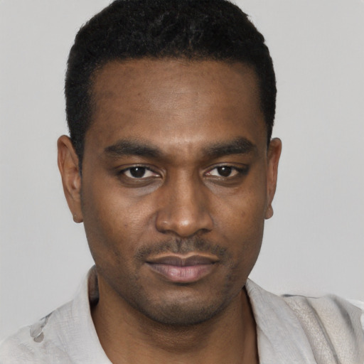 Neutral black young-adult male with short  black hair and brown eyes