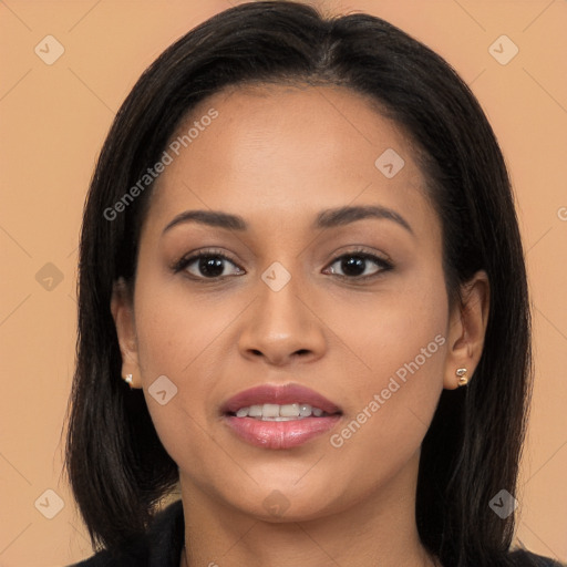 Joyful latino young-adult female with long  brown hair and brown eyes