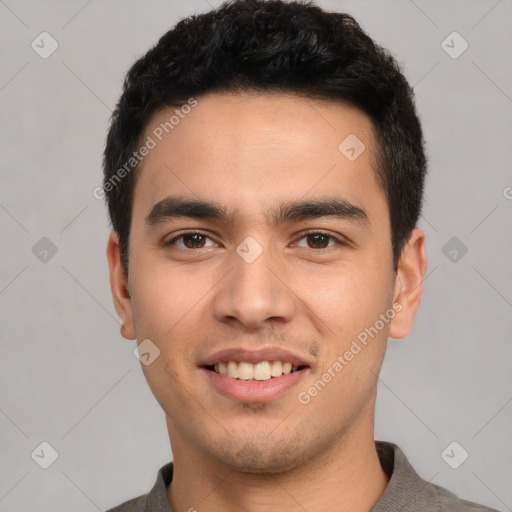 Joyful white young-adult male with short  black hair and brown eyes