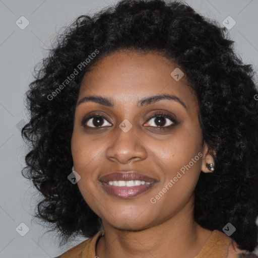 Joyful black young-adult female with medium  black hair and brown eyes