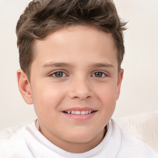 Joyful white child male with short  brown hair and brown eyes