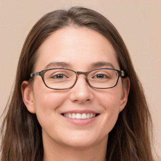 Joyful white young-adult female with long  brown hair and grey eyes