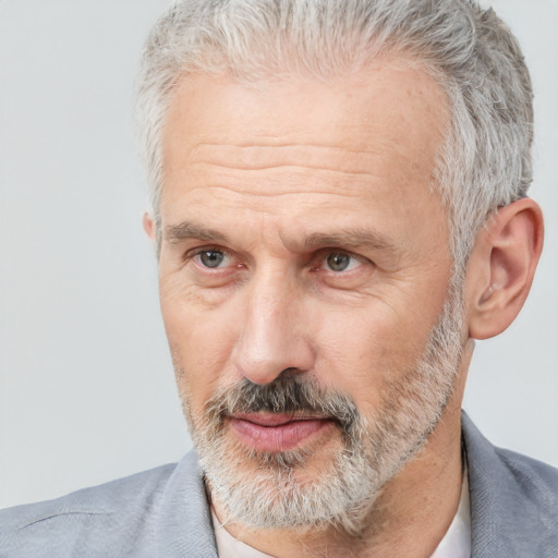 Neutral white middle-aged male with short  gray hair and brown eyes