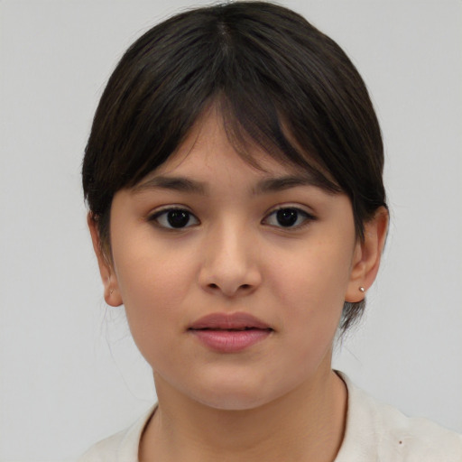 Neutral asian young-adult female with medium  brown hair and brown eyes