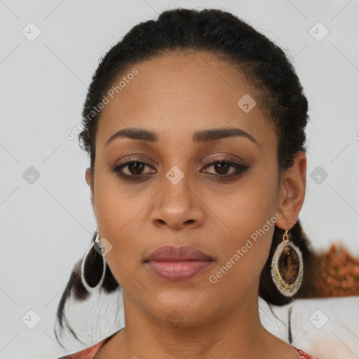 Joyful latino young-adult female with medium  brown hair and brown eyes