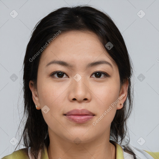 Joyful asian young-adult female with medium  brown hair and brown eyes