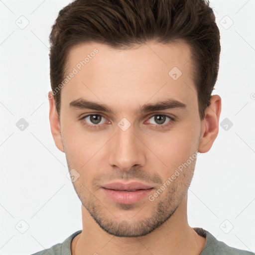 Neutral white young-adult male with short  brown hair and brown eyes