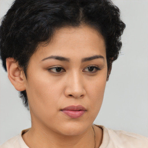 Neutral latino young-adult female with short  brown hair and brown eyes