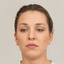 Neutral white young-adult female with short  brown hair and brown eyes