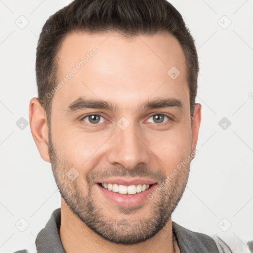 Joyful white young-adult male with short  brown hair and brown eyes