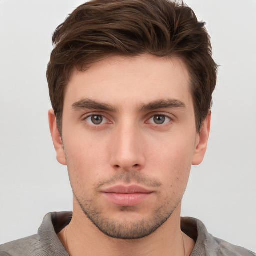 Neutral white young-adult male with short  brown hair and brown eyes