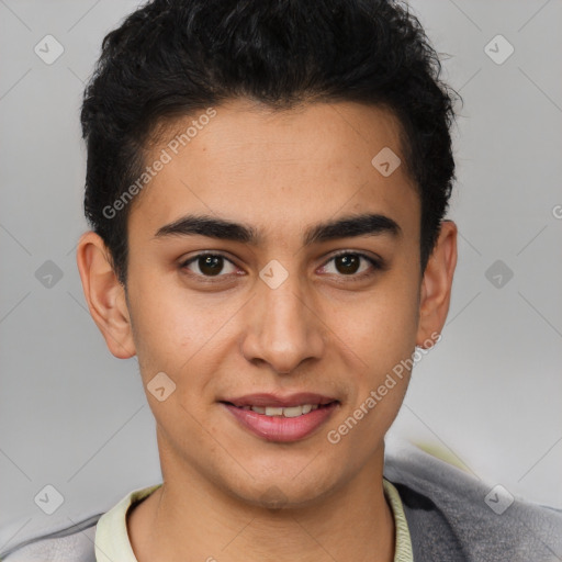 Joyful latino young-adult male with short  brown hair and brown eyes