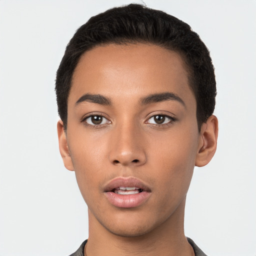 Neutral latino young-adult male with short  black hair and brown eyes