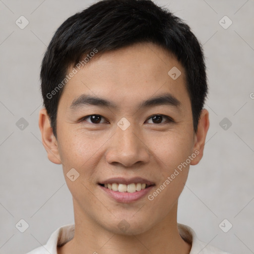 Joyful white young-adult male with short  black hair and brown eyes