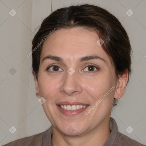 Joyful white adult female with medium  brown hair and brown eyes