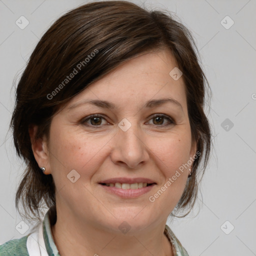 Joyful white adult female with medium  brown hair and brown eyes