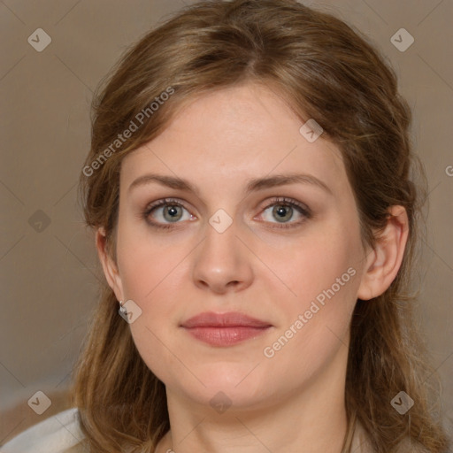 Joyful white young-adult female with medium  brown hair and green eyes