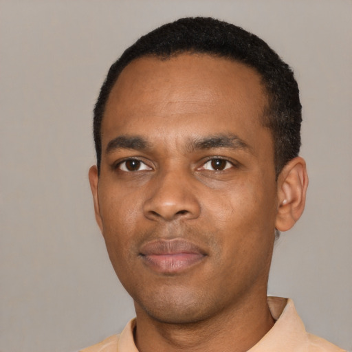 Neutral black adult male with short  black hair and brown eyes