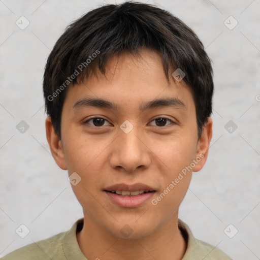 Joyful asian young-adult male with short  brown hair and brown eyes